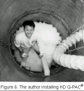 Ming Wu installing HD Q-PAC media